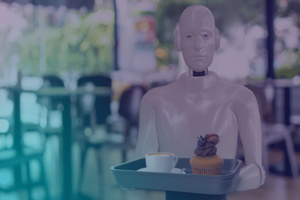 A humanoid robot holding a tray with a cup of coffee and a cupcake, standing in a café setting with blurred tables and chairs in the background.