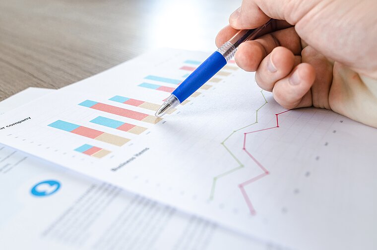 Manager analysing data to improve his hospitality business