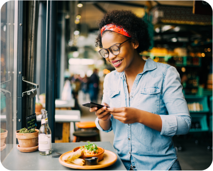 Woman taking picture of a dish