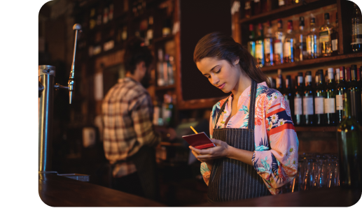 Bartender woman taking an order