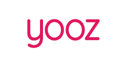The image shows the word yooz in lowercase, bold, pink letters on a light grey background.