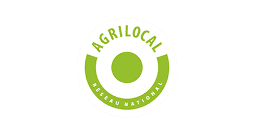 Green and white circular logo with the word Agrilocal at the top, Réseau National at the bottom, and a solid green circle in the centre, reflecting a connection to Hospitality Development Services.