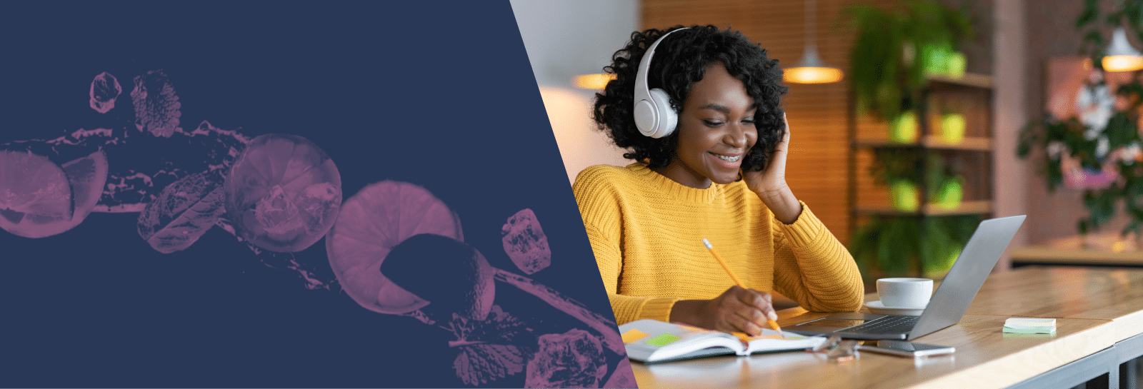 A woman wearing headphones smiles whilst writing in a notebook and looking at her laptop. She sits at a wooden table with a cup, and plants are visible in the background. The left side of the image has a blue and purple abstract design.