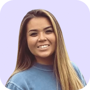 A woman with long, straight hair and a blue top smiles at the camera against a light purple background with rounded corners.